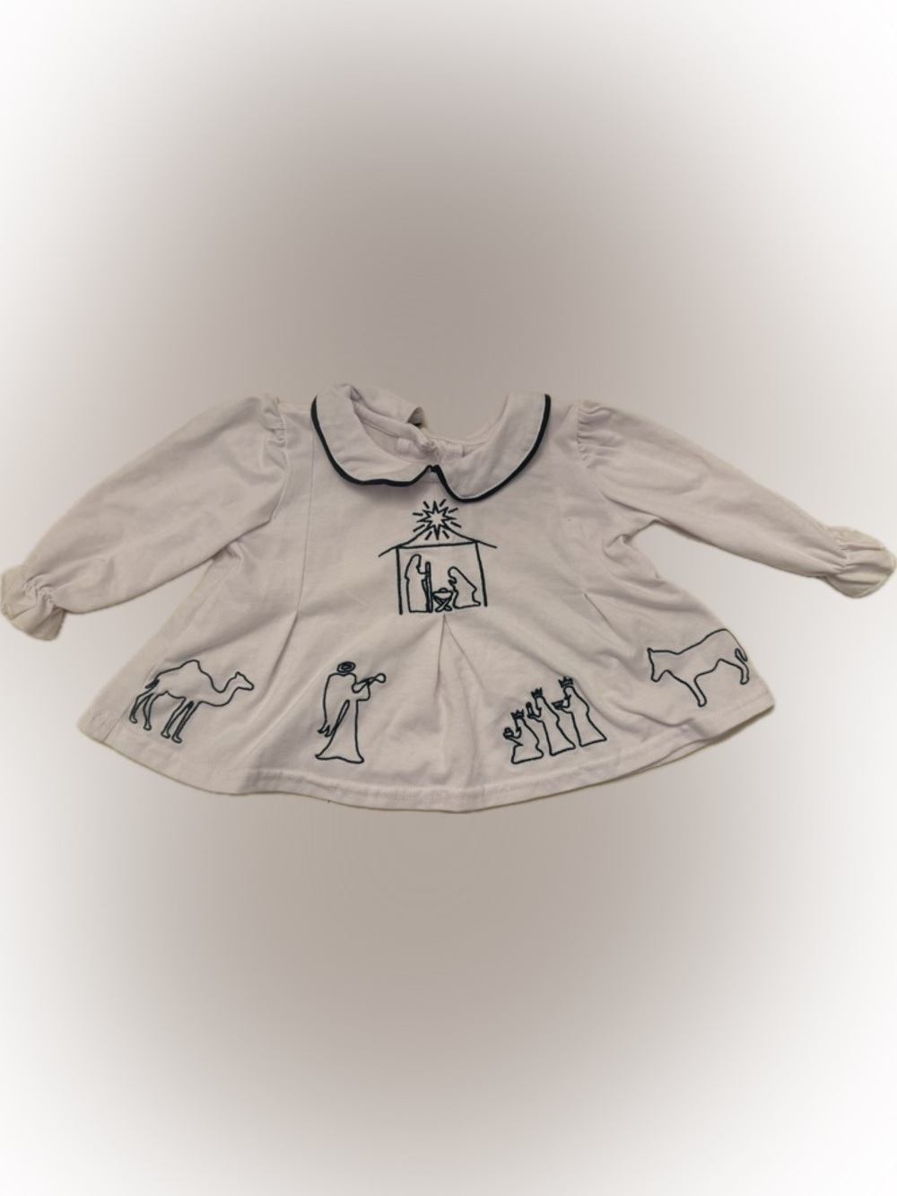 Christmas top with embroidered nativity scene